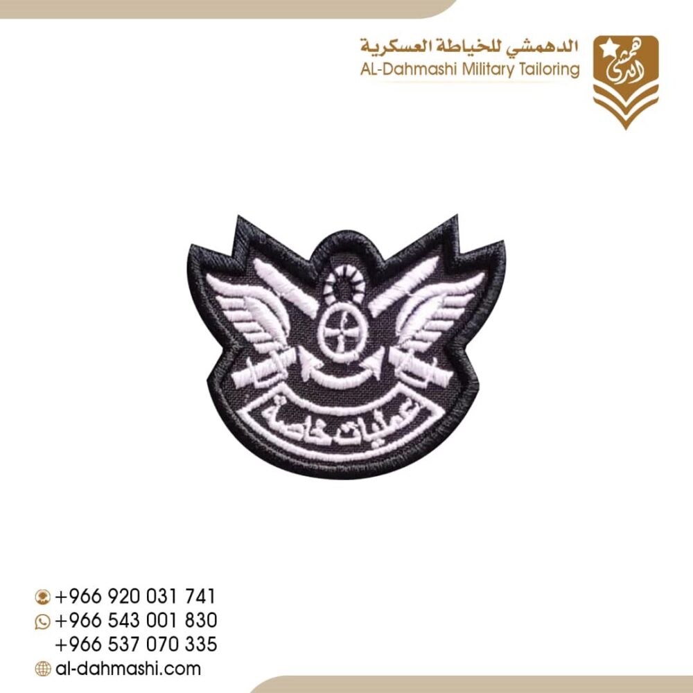 ونق عمليات خاصه قماش بني تطريز ابيض